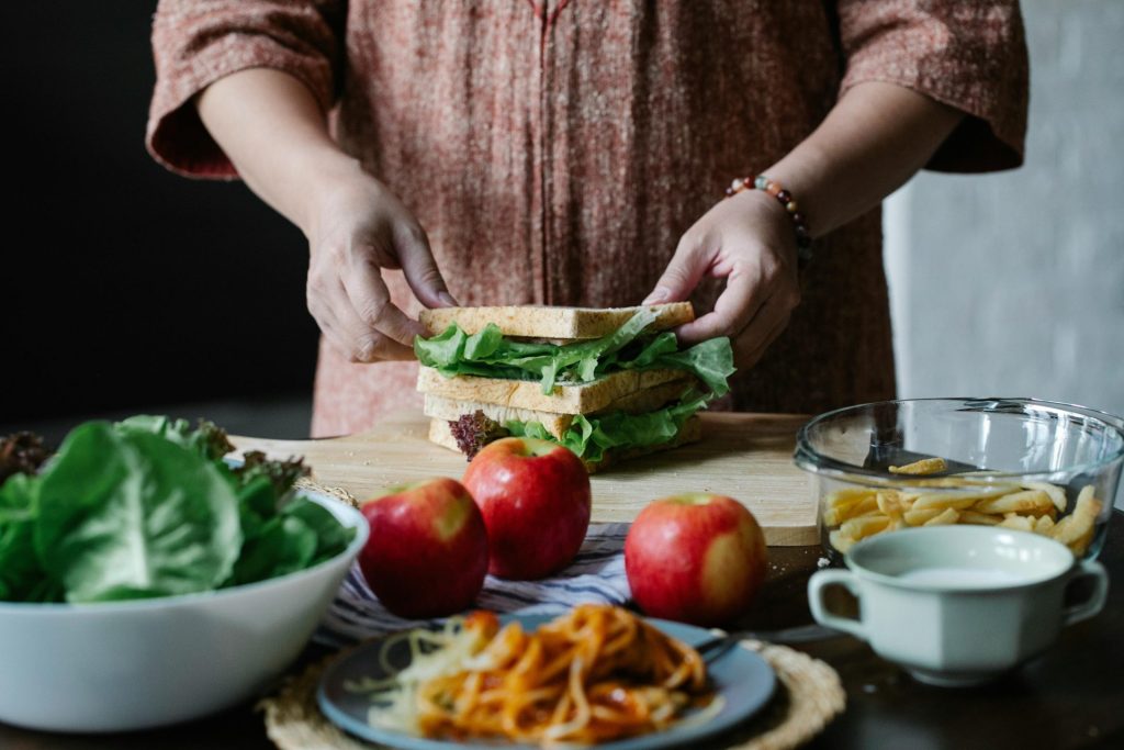 caregiver preparing a meal